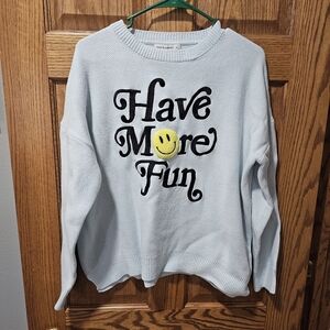 Light Blue Sweater with Fun Graphic